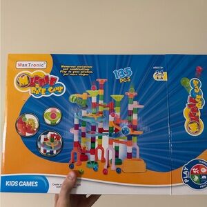 Brand new marble run game.
Can be a run or a game.
Box included